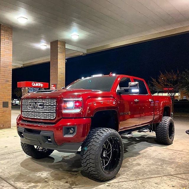 This is a bad ride!!! #truckporn #gmc #diesel #denali #lifted #wheels #tires #duramax #red #gas.